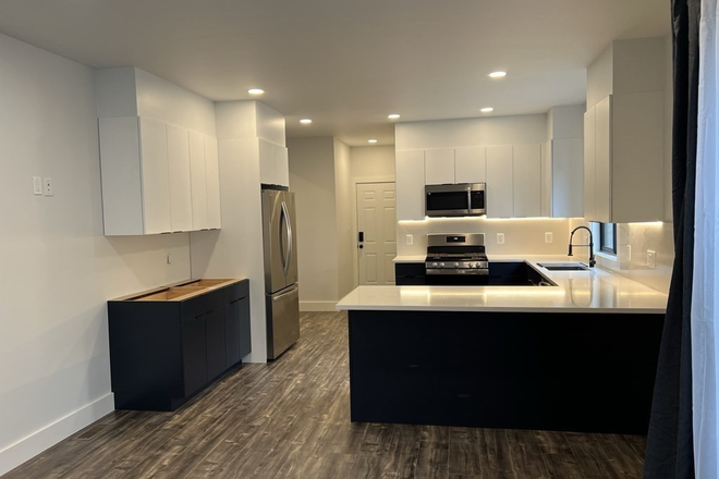 kitchen - New Updated House! Prime BC location, In-unit laundry, off street parking included.