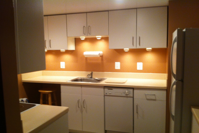 Part of kitchen, shows extra lighting - Arlington North Apartments