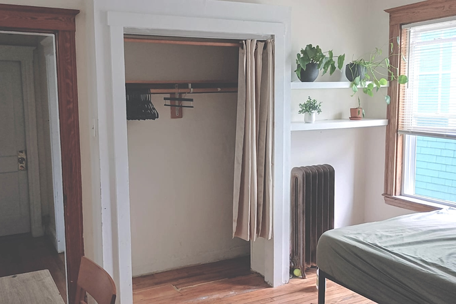 AVAILABLE BEDROOM. The Closet extends behind the wall and shelves. Very spacious. - ROOMMATE or SUBLET  NEEDED. INEXPENSIVE. PRIME J.P. LOCATION. FURNISHED (opt.)