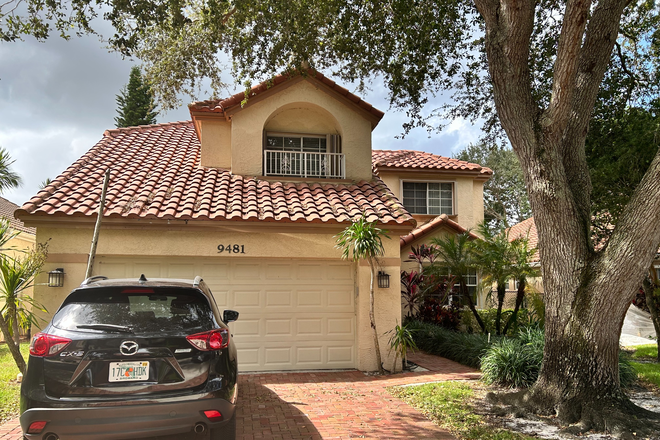 Front of house - Furnished waterfront home with pool.