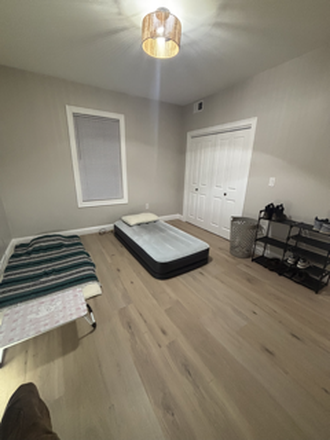 Primary Bedroom (room 2) - Female: 2/4 rooms available $900/mo sunroom and $1,300/mo primary bedroom w/ privatebathroom Apartments