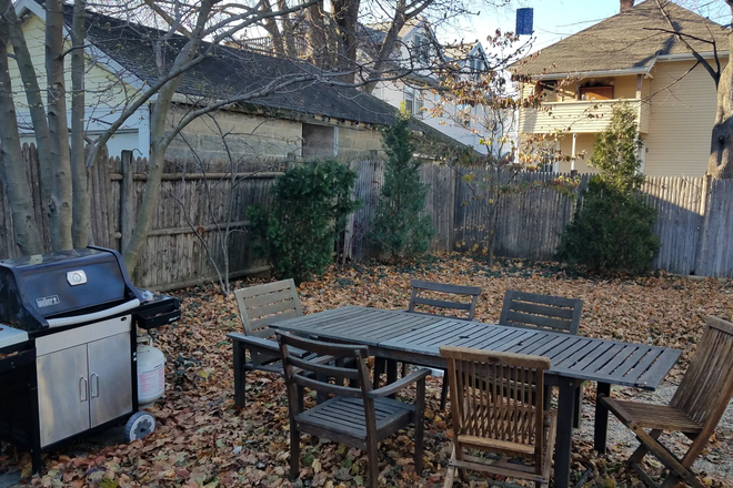 backyard - Fully furnished 3+ bedroom home in a 2 family historical home in Arlington Center