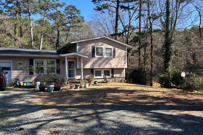 Front of home, Street view - Light filled apartment in single family home