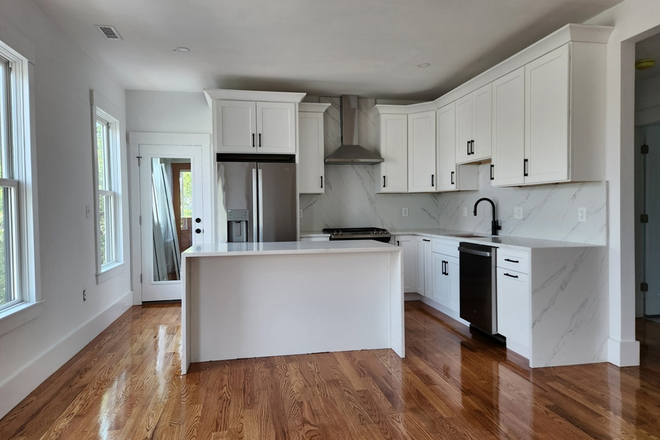 kitchen - STUNNING, Renovated 3 Bed / 2 Bath w/ LAUNDRY IN UNIT! Seconds to blue line! Avail. NOW! Apartments