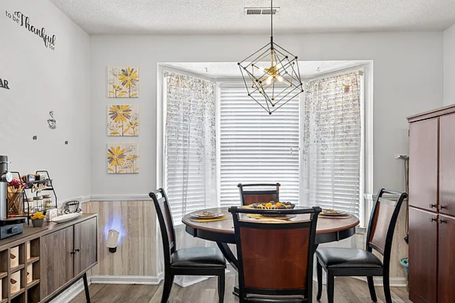 Dining room with bay window - 3 Bedroom 2.5 Bath Townhouse with Private Backyard!
