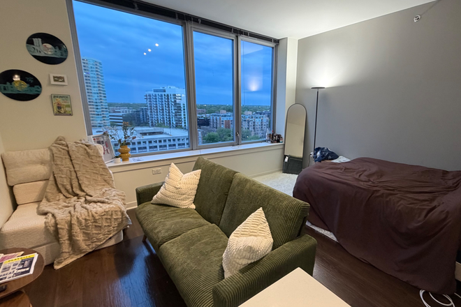 Living room and Bedroom view - Summer Sublet: Studio at E2 (full amentity building) only a 10 minute walk from campus Apartments