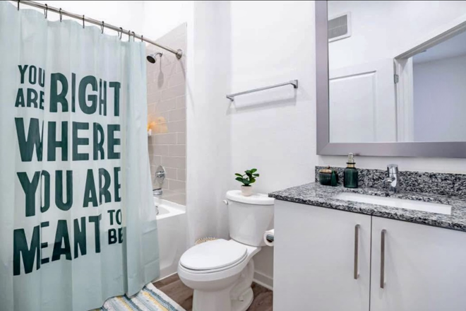 bathroom - *First Month Free * Accolade West close to campus-full size in unit laundry 2 heated pools & gym Apartments