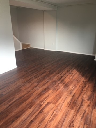 Living room - One bedroom available in town house walking distance to UMD Campus!