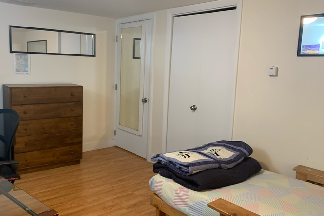 Suite bedroom. Facing away from window toward closet door, and door to kitchenette and bathroom - 1 BR, 3/4 BA. kitchenette suite in no-meat shared home (friendly dog welcome)