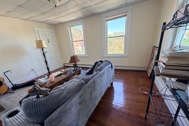 Living room - Sunny Recently Renovated 2BR Apartment AVAIL 09/1- Heat Inc /Laundry onsite