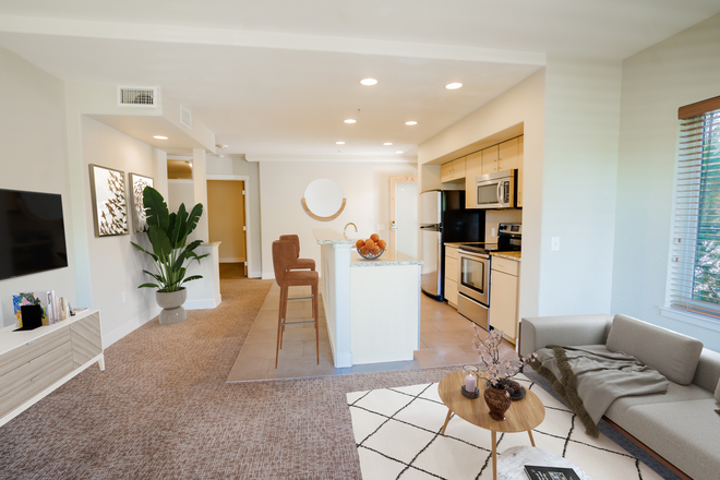 Living room and kitchen area - 4 bed / 4 bath The Ledges - Entire Unit for rent. Across from UMC.