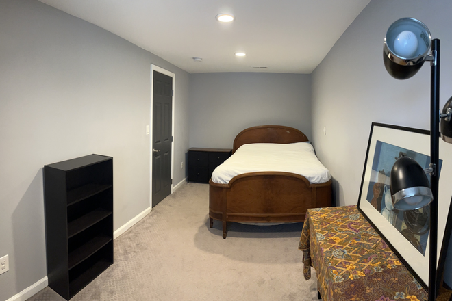 Full-sized bed and side table - LARGE, furnished private room w/full bath + easy parking – Near Petworth/Takoma Townhome