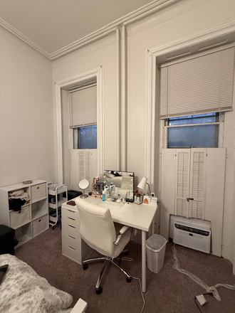 Bedroom 1, street facing windows - 2 Rooms Available at 208 S 41st St **RENT NEGOTIABLE** Townhome