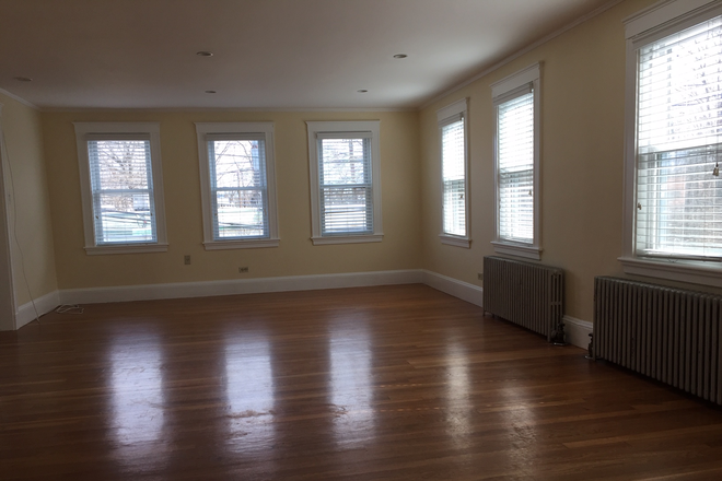 living room - 2 Bed/1 Bath on MBTA D Line 20 minutes to Longwood $2,800 includes washer/dryer & parking AVAIL 7/1 Apartments