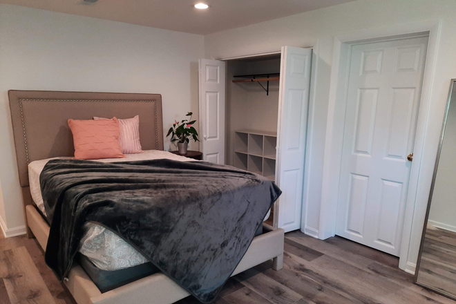 Bedroom area with closet - $945 - Recent Reno, furnished, oversized suite w/private entrance, kitchenette House