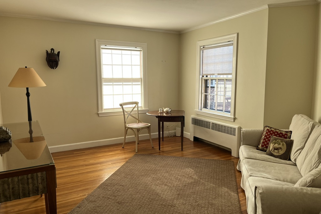Large living room with windows overlooking courtyard - Fully Furnished 2 BR, well-maintained condo, desirable W.Cambridge, Faculty/PostDoc at Harvard/MIT