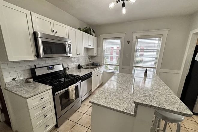 Updated Kitchen - Perfect blend of modern updates and neighborhood charm 1/2 block from Tufts near Davis/Teele Sq. Condo