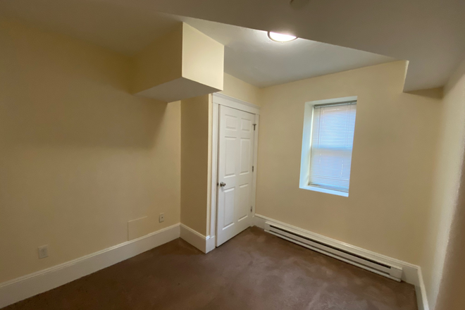 Visit hubrealtyproperties.com - Large 3 bedroom, basement level with updates, in the Fenway Apartments