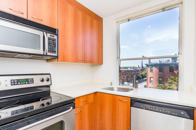 Call NOW for showings! 617-236-8550 - MASS AVE - LUXE 2BR/1BA FOR *9/1/2026* W/ ROOF DECK, H&HW INC, LNDRY IN BLDNG, EQUAL BDRMS, FIREPLCE