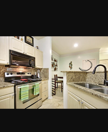 Kitchen - Cozy 1 bedroom fully furnished Utilities Included Condo