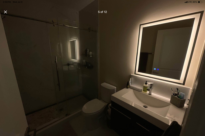 bathroom with shower and different LED lights on mirror - Summer Sublet JULY/AUGUST! 10 min walk to campus $1,333 Apartments