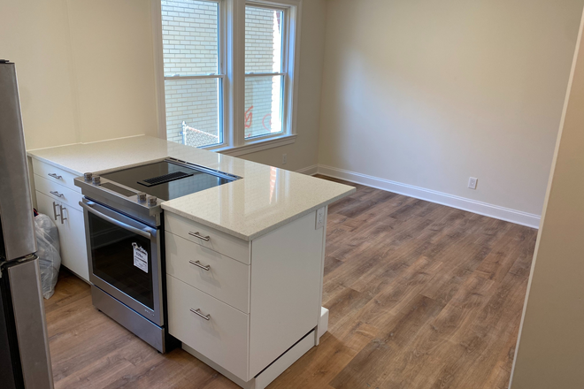 Kitchen Living Room - 4240 39th Street NW - AU / Tenleytown - 2 Bedroom / 2 Bathroom - In-Unit W/D Apartments