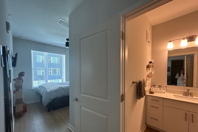 Bedroom and bathroom hallway - Ufora Gainesville Apartments
