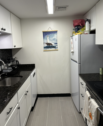 Kitchen - full size electric range and fridge - 1 Bedroom Close to Campus w/ Private Patio Condo