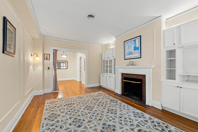 Living room - Fab2 BR+ den, 2 BA condo; Historic bldg steps from Homewood Campus,