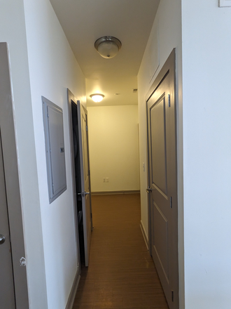 Hallway with washer/dryer and den - Relet:1BR apt for PU Faculty/Staff only-113 Stanworth Lane-Princeton