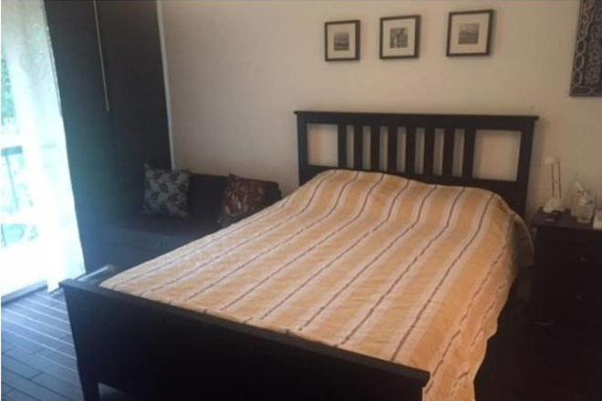 Bedroom - Charming two-story condo in Greene Countrie Village, close to campus