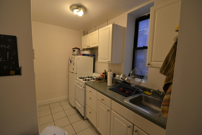 Kitchen - Just Renovated 4 Bedrooms with 2 Full Baths in Westland Ave 9/1/26 Apartments