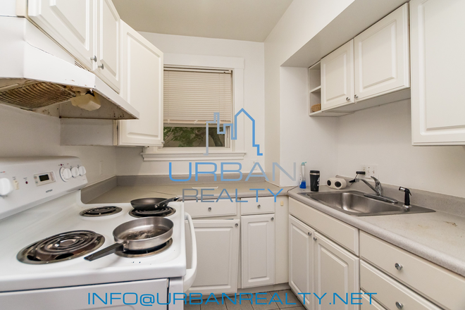 KITCHEN - *** NOW RENTING 2026-2027*** LARGE 6 BED 2 BATH DUPLEX ON GERALD RD Apartments