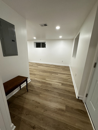 main entrance and living room - 1 bedroom/1 bath with kitchen and laundry connection; newly renovated with new appliances