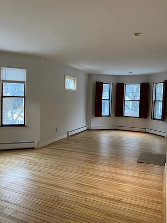 Living and Dining Rooms - Rare opportunity! Lovely, spacious, 1 BR/1 BA condo in small condo building ½ block from Porter Sq