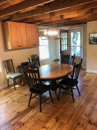 Dining Area - Available for a group of 4! 4 bedroom home in South Kingstown!