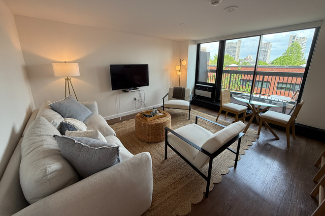 Living Room - 2 Bedroom - 1.5 Bath Top Floor, Elevator Building, Duplex Apartment (Furnished, In-Unit Laundry)