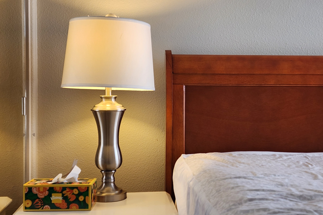 nightstand of the bedroom for lease - Bedroom with Private Bath for Rent in Italian-Style Gated Community in Irvine Condo