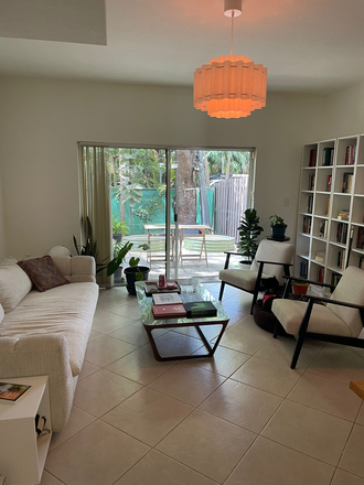 Living area with patio access. To be share. - Room for rent in Brickell/Miami 3 mi. to  UM/Miller Townhome