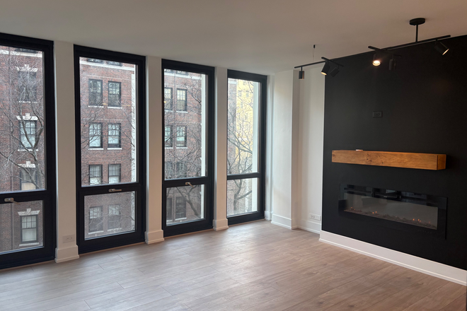 Living Area - Modern Gold Coast Studio Near CTA – Rooftop Pool, Utilities + Internet Included Condo