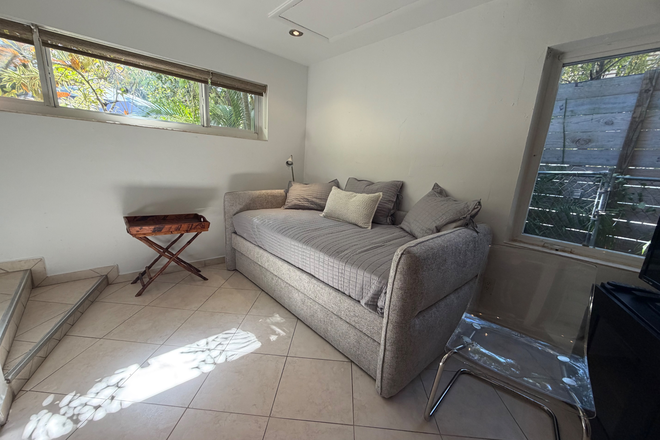 Trundle bed living area - Very Clean bright and secure efficiency in a desirable neighborhood in Coconut Grove Apartments