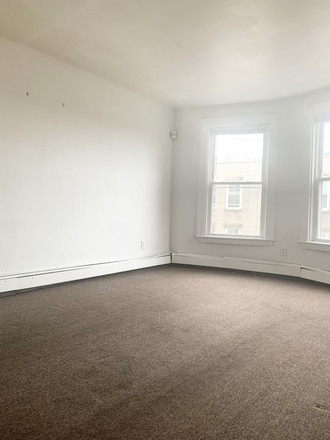 Living room - Sun filled 3 bed apartment avail. on Parker Hill Ave. in Mission Hill!