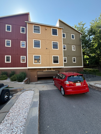 Building exterior, garage entrance - Roommate Needed for 7 Mo Sublet of 1 Bedroom in 2 Bedroom Apt near Campus