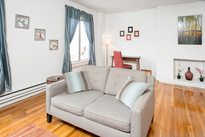 Living - Back Bay Furnished Studio w/ Skyline Views Apartments