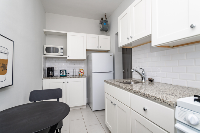 Visit hubrealtyproperties.com - Fantastic location, large studio alcove in professionally managed building Apartments