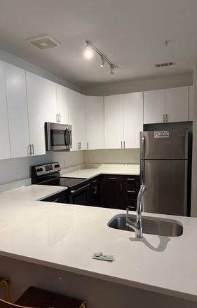 Spacious Kitchen - Landmark Apartments 4x2 Layout! Closest to Campus! Great Amenities