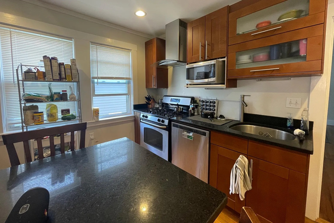 Kitchen - Modern 4 bed w/ 2 car parking incl. & multiple outdoor spaces! NO FEE Apartments