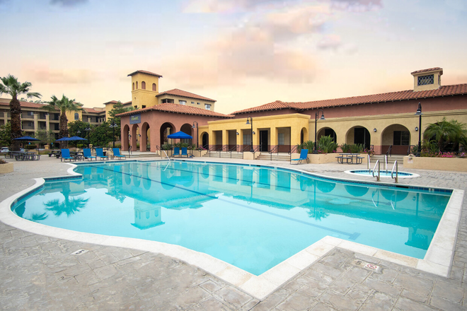 Resort-Style Pool & Hot Tub - GrandMarc at University Village Apartments