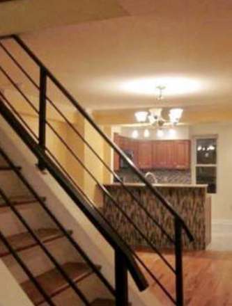 Stairs with metal railing - Location! Location! Check this home in the heart of East Falls!