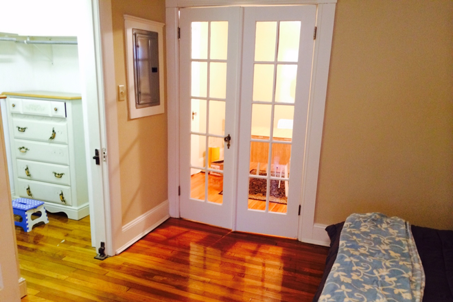 french doors - Available August 15th Jr 1 bdrm, hardwood flrs, heat & hot h2o included, balcony, yard Apartments